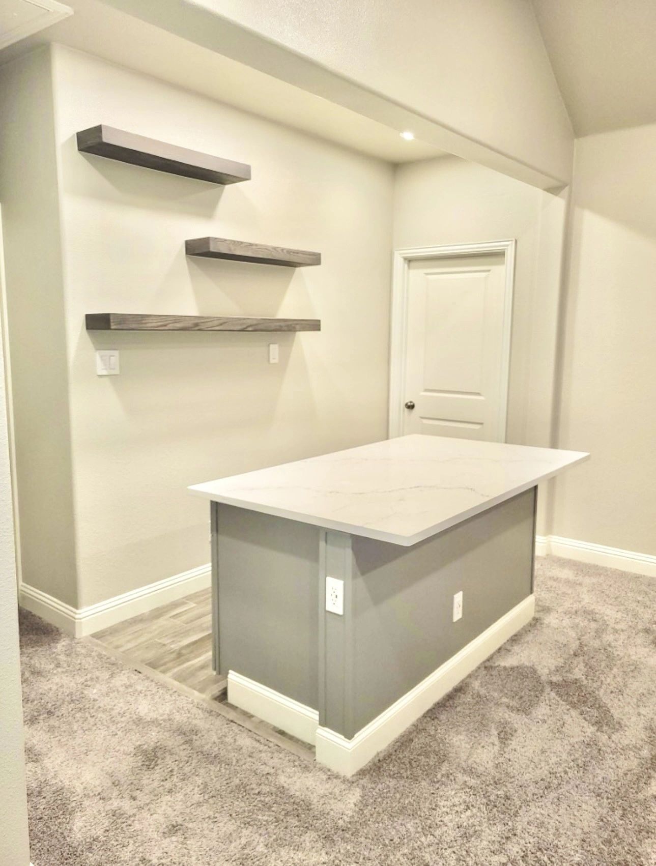 Custom built home bar with shelving